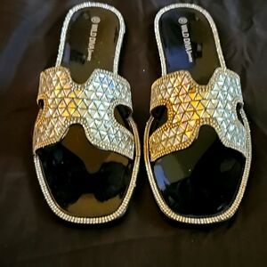 WORN ONCE SIZE 10 SLIDES.